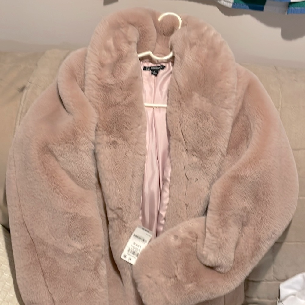 Beautiful size L fax fur INC INTERNATIONAL. Never worn. Brand new with tags.